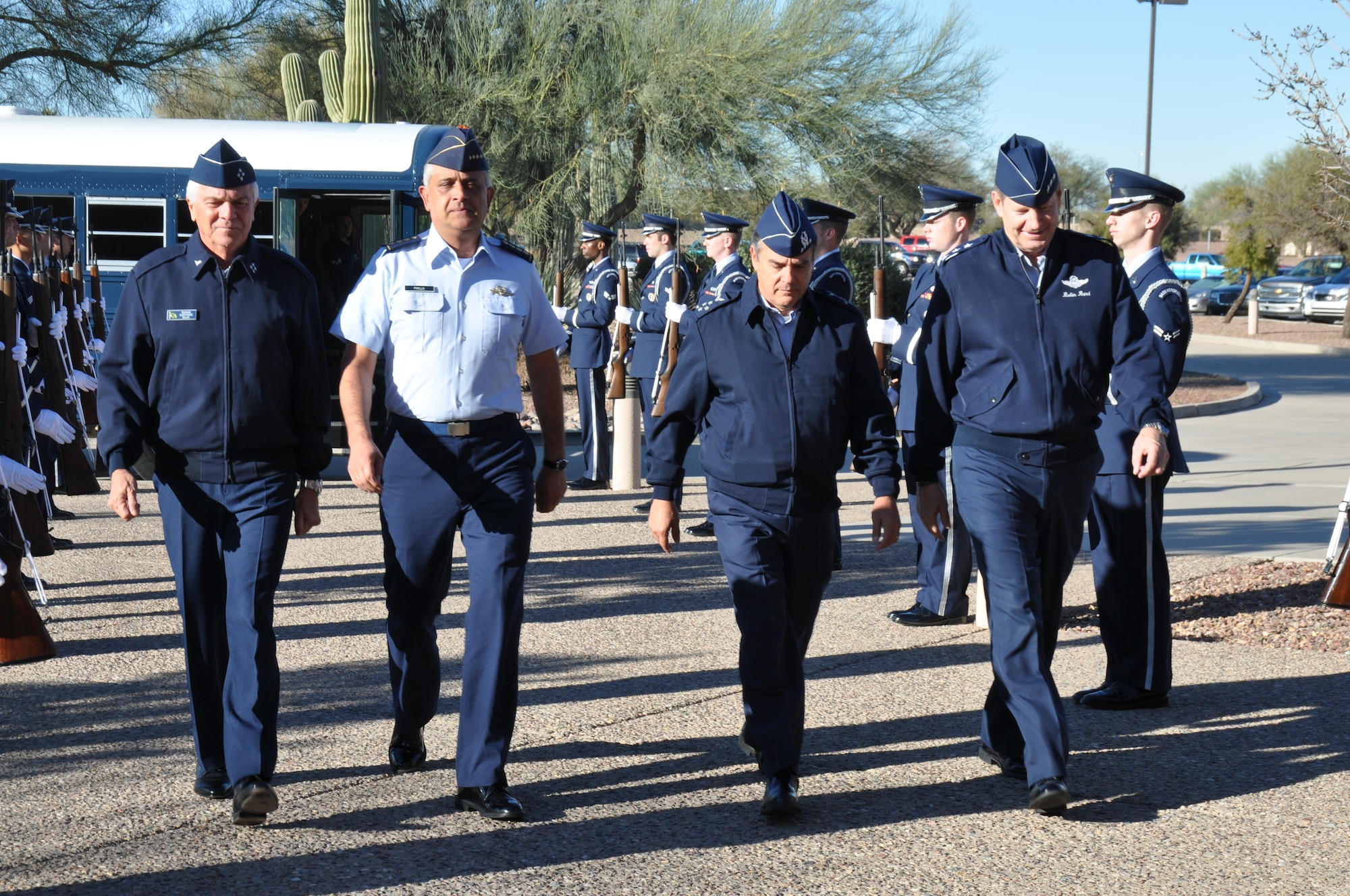 Gen. Aprigio Eduardo De Moura Azevedo, Brazilian Air Force Chief of Staff, Gen. Tito Pinilla, Colombian Air Force Commander in Chief, Gen. Jorge Rojas, Chilean Air Force Commander in Chief, and  Lt. Gen. Robin Rand, 12th Air Force (Air Forces Southern) commander  walk through an honor cordon at Davis-Monthan AFB, Ariz., Feb. 26. The partner nation air chiefs are visiting AFSOUTH to attend the Latin American Interoperability Workshop, Feb. 26 -28. The objective of the workshop is to unite influential Air Force Chiefs in the U.S. Southern Command area of responsibility in developing strategies to counter transnational organized crime, build partnership capacity and plan for emergency situations such as humanitarian assistance and disaster relief efforts. (U.S. Air Force photo by Master Sgt. Kelly Ogden/Released).