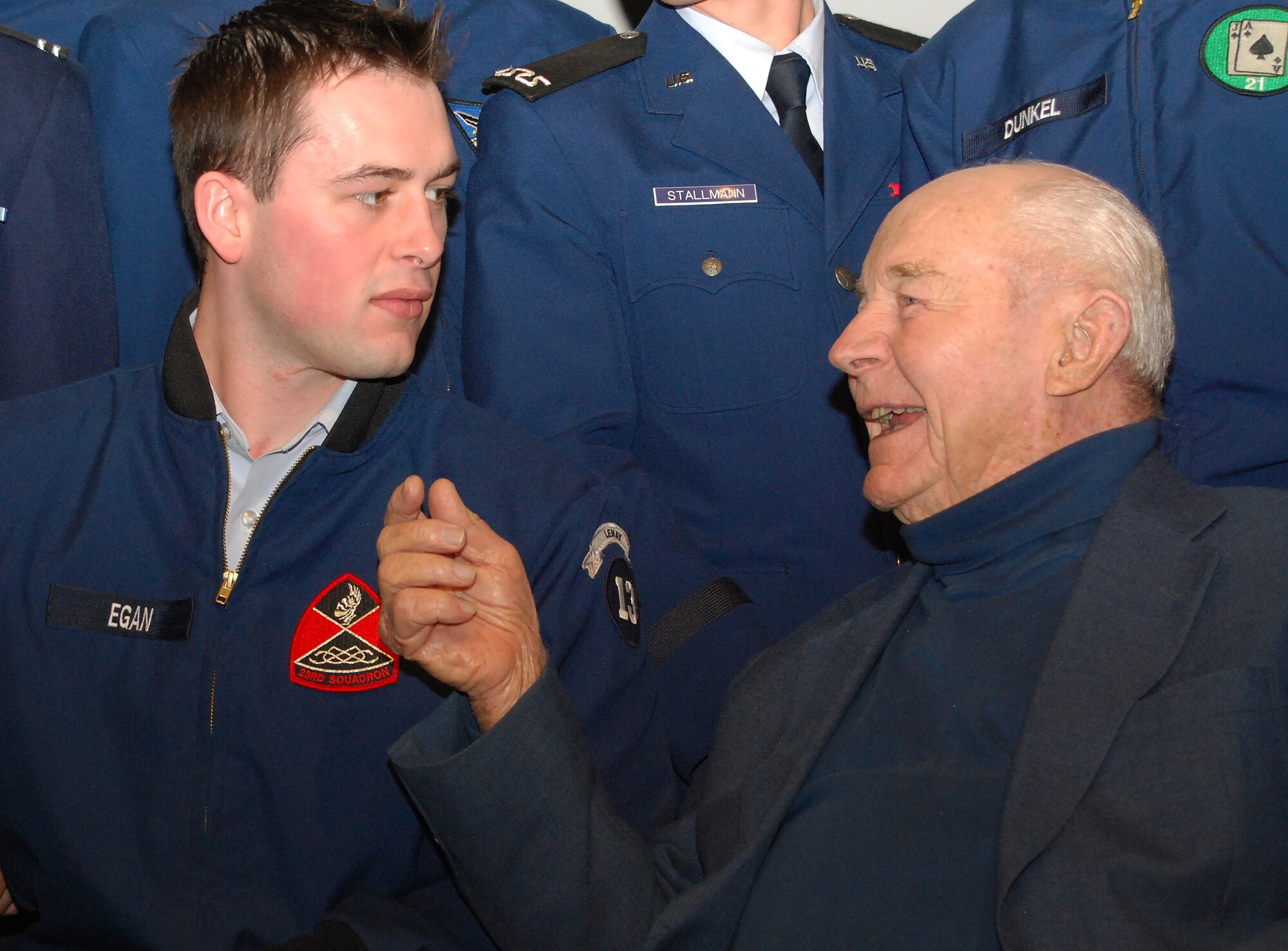 Retired Brig. Gen. Chuck Yeager, right, talks to Cadet 1st Class Henry Egan after a National Character and Leadership Symposium presentation at the Air Force Academy Feb. 22, 2013. Yeager was the first person to fly faster than the speed of sound, having made the historic flight Oct. 14, 1947. Egan is assigned to Cadet Squadron 23. (U.S. Air Force photo/Don Branum)
