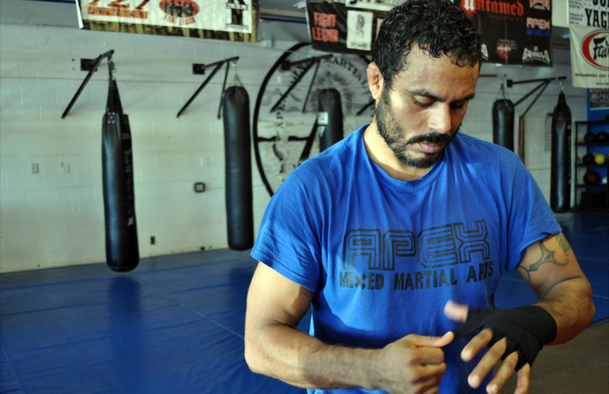 Tech. Sgt. Michael Parker prepares for an MMA training session at his gym of choice in Tucson, Apex Mixed  Martial Arts. (Courtesy photo)