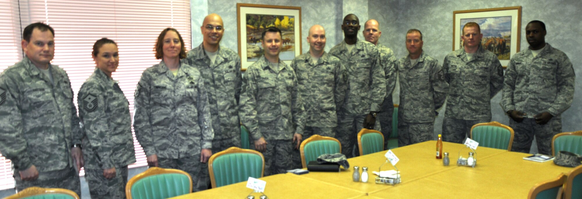 GOODFELLOW AIR FORCE BASE, Texas – The Goodfellow First Sergeants’ Council, along with Chief Master Sgt. Robert Frank, Air Force first sergeant special duty manager, pose for a picture at the Western Winds Dining Facility here, Feb. 19. They met in the dining facility for Operation Warmheart, where they handed out gift cards to military members. (U.S. Air Force photo/ Airman 1st Class Joshua Edwards)