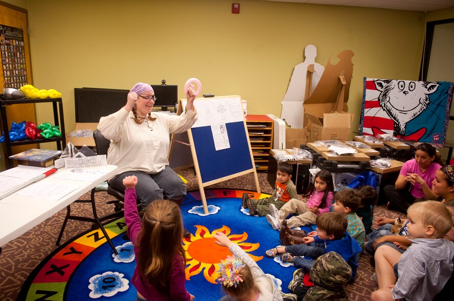 Emily Enderle, 23d Force Support Squadron library technician, asks for a volunteer during story time Feb. 19, 2013, at the Moody Air Force Base, Ga., Library. Enderle has worked at the Moody Library for three years. (U.S. Air Force photo by Senior Airman Jarrod Grammel/Released)

