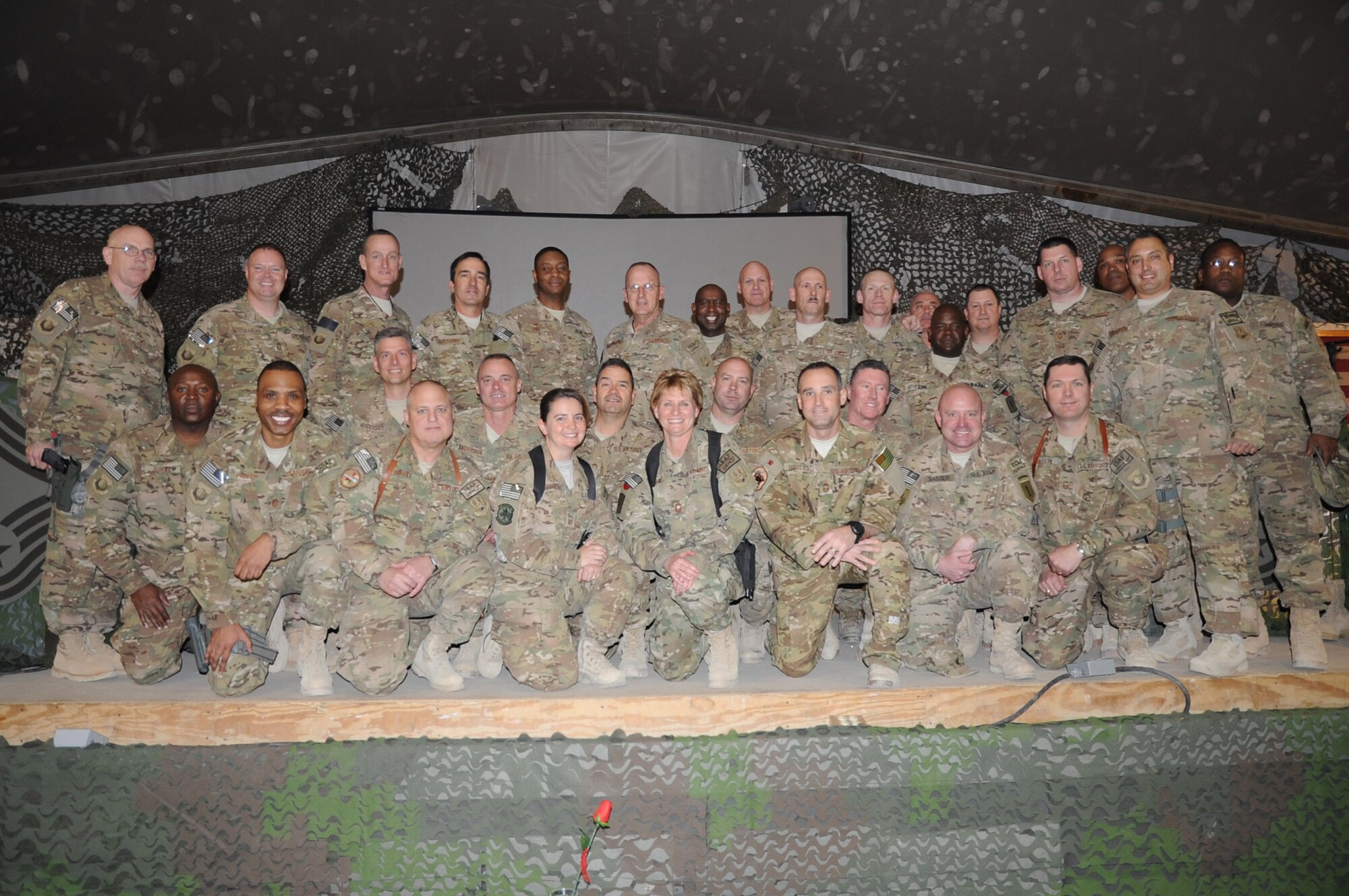 Top enlisted members from units across Bagram Airfield and northern Afghanistan pose for a picture at the chief master sergeant induction ceremony on BAF, Feb. 24, 2013. The ceremony recognized three members of the 455th Air Expeditionary Wing selected for promotion to the Air Force's highest enlisted rank, which by law only one percent of the enlisted force can hold. (U.S. Air Force photo/Staff Sgt. David Dobrydney)