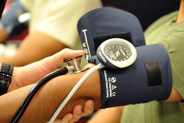 A U.S. service member’s blood pressure is checked at the Exchange on Kadena Air Base, Japan, Feb. 21, 2013. Blood pressure checks were performed by U.S. Naval Hospital Okinawa personnel during a Joint Health Promotion Fair. (U.S. Air Force photo/Naoto Anazawa)

