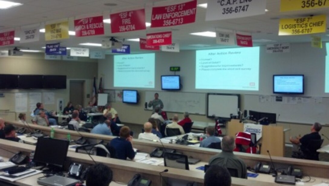 Col. Mark Deschenes talks to participants during the Dam Safety Tabletop Exercise for Coralville Lake held at the Johnson County Joint Emergency Communications Center last fall.