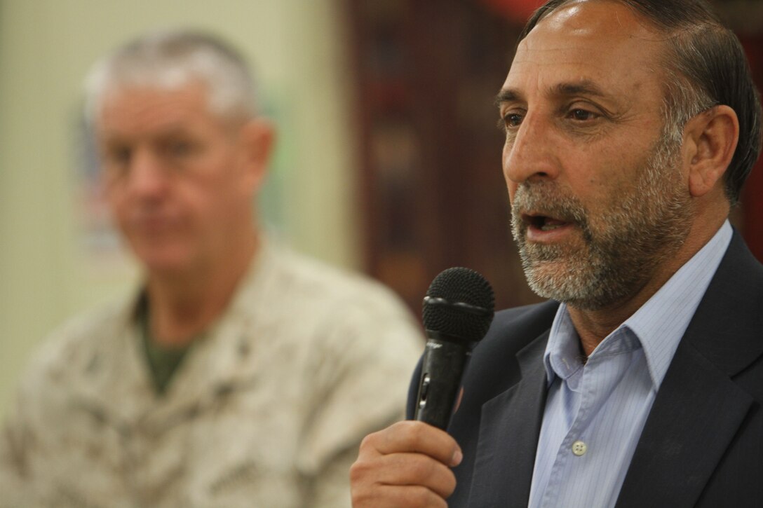 Mohammad Sarwar Subat, the Nimroz province governor, speaks to distinguished coalition and Afghan officials from both Helmand and Nimroz provinces during the I Marine Expeditionary Force (Forward) farewell dinner at the Afghan Cultural Center here, Feb. 24. Sabet, the Nimroz province governor, whose province benefitted greatly this past year when U.S. and coalition forces handed over control to ANSF, said it’s “our time to stand up and take our country back.” Noting Afghanistan looks completely different today than it did 11 years ago, the governor vowed to continue, “To fight the insurgency and provide freedom in his province.” (Official U.S. Marine Corps photo by Sgt. Bryan A. Peterson)