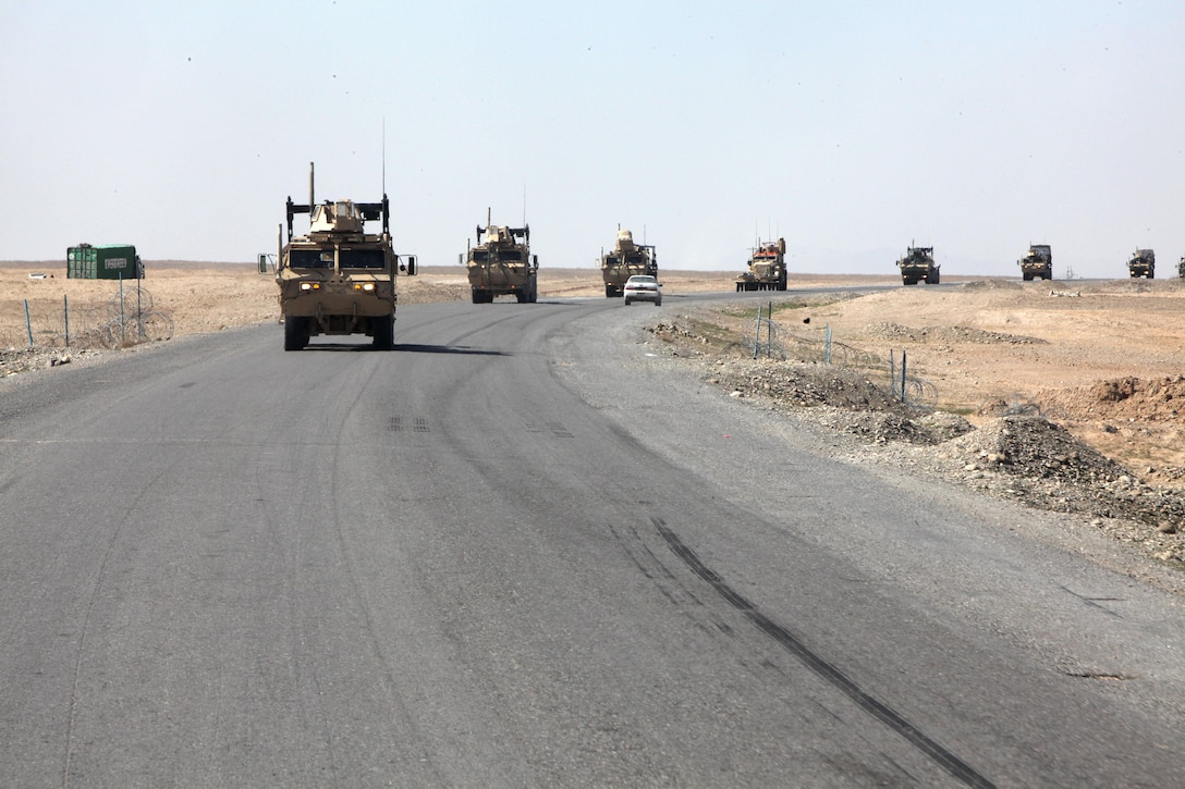 U.S. Marines with Transportation Support Company, Combat Logistics Regiment 2 (CLR-2) take part in Operation Dynamic Partner in Helmand province, Afghanistan, Feb. 11, 2013. CLR-2 provided tactical logistics support to Regimental Combat Team 7 (RCT-7) in order to extract equipment from VSP Shurakay to facilitate its demilitarization. (U.S. Marine Corps photo by Sgt. Anthony L. Ortiz / Released)