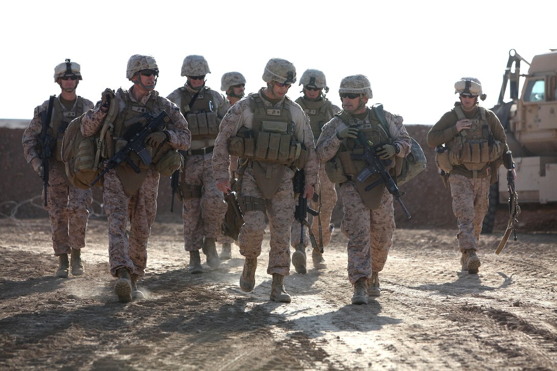 U.S. Marine commanding officers, executive officers and sergeants major from Combat Logistics Regiment 2 (CLR-2) and Regimental Combat Team 7 (RCT-7) visit their Marines and Sailors during Operation Dynamic Partner in Helmand province, Afghanistan, Feb. 14, 2013. CLR-2 provided tactical logistics support to Regimental Combat Team 7 (RCT-7) in order to extract equipment from VSP Shurakay to facilitate its demilitarization. (U.S. Marine Corps photo by Sgt. Anthony L. Ortiz / Released)
