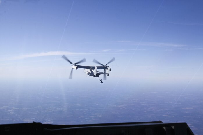 Marines with Marine Medium Tiltrotor Squadron 263 supported Navy SEALs and parachute riggers with Naval Special Warfare Logistics and Support Two, an Air Force combat controller team and Army Special Forces with parachute operations in Emporia Airfield, Va., Feb. 20.
The service members jumped by static line and military free fall from the back of an MV-22B Osprey several times at heights of 1,500 feet to 12,500 feet in the air.
