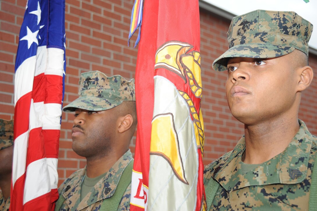 Marines with Marine Corps Logistics Command practice precision color guard movements recently in front of Marine Depot Maintenance Command.