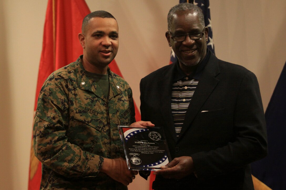 Lt. Col. David Everly, left, presented Willie Buchanon, right, with a plaque on behalf of the National Naval Officers Association's Camp Pendleton-Miramar Chapter and Naval Hospital Camp Pendleton for his participation as a guest speaker during an historical program held at the naval hospital here, Feb. 26.
Everly is the president of the NNOA chapter here and Buchanon is a retired NFL cornerback who played for the San Diego Chargers and grew up in Oceanside.