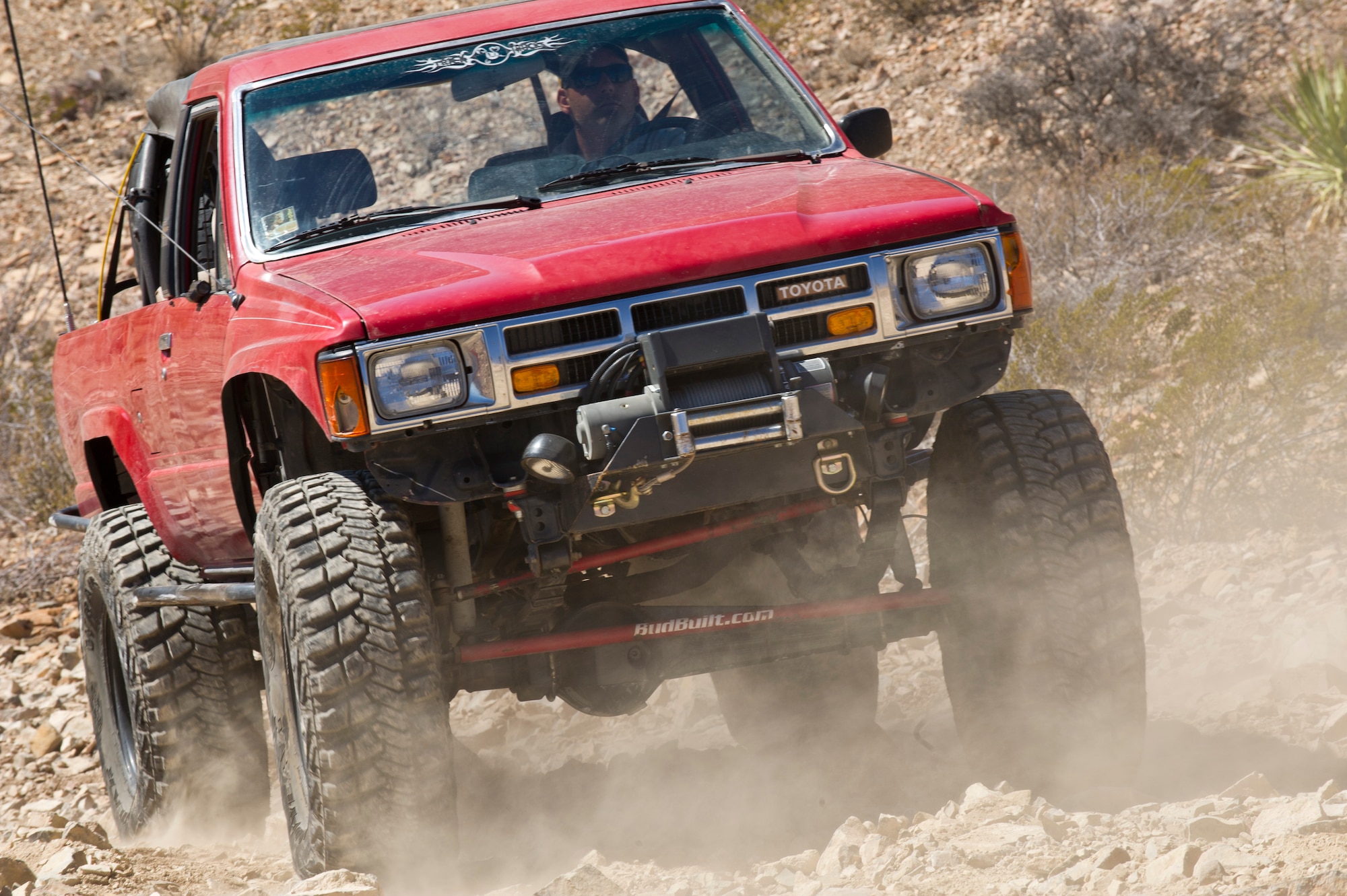 Master Sergeant James (last name withheld due to operations security) maneuvers an extreme course during the 23rd Annual Chile Challenge Off-Road Trail Event in Las Cruces New Mexico Feb. 21. James has been off-roading for more than 30 years and uses off-roading as a positive outlet to release stress incurred from work and other daily activities. The Chile Challenge, sponsored by the Las Cruces Four-Wheel Drive Club, gave drivers of all experience levels the opportunity to ride on trails led by an experienced trail leader. (U.S. Air Force photo by Senior Airman Joshua Turner/Released)
