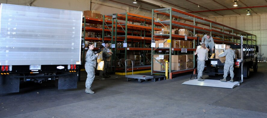 Airmen assigned to the 2nd Logistics Readiness Squadron Aircraft Parts Store, unload a shipment of aircraft parts on Barksdale Air Force Base, La., Feb. 27. The APS provides a supply point for maintainers who need parts to fix B-52H Stratofortress bombers. The parts range from windows, electronic components, wings and classified material. (U.S. Air Force photo/Airman 1st Class Andrew Moua)