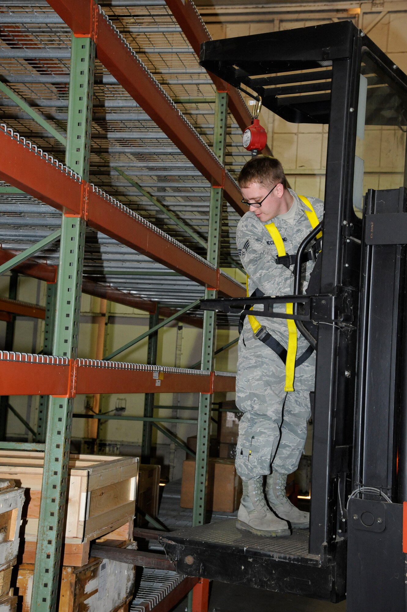 Senior Airman Casey McClelland, 2nd Logistics Readiness Squadron Aircraft Parts Store, retrieves a pallet of aircraft parts on Barksdale Air Force Base, La., Feb. 27. The APS is responsible for more than 5,000 assets worth more than $28 million. (U.S. Air Force photo/Airman 1st Class Andrew Moua)