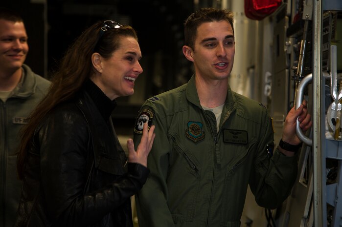 Actress Brooke Shields shares a laugh with Capt. Matt Van Osterom, 16th Airlift Squadron pilot, as he briefs her on the capabilities of a C-17 Globemaster III Feb. 22, 2013, at Joint Base Charleston-Air Base, S.C. Shields was at JB Charleston preparing for her upcoming role on the TV series Army Wives. (U.S. Air Force photo/Staff Sgt. Rasheen Douglas)
