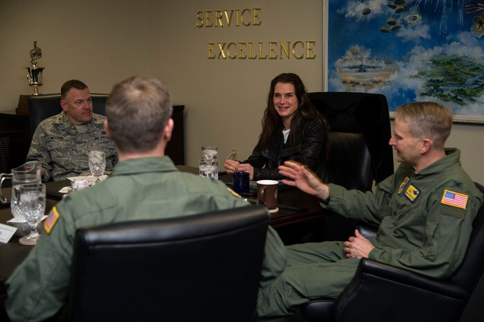 Colonel Richard McComb, 628th Air Base Wing commander (left), Col. Trevor Nitz, 437th Operations Group commander, and Col. Darren Hartford, 437th Airlift Wing commander (right), welcome actress Brooke Shields to Joint Base Charleston- Air Base, S.C., during her visit Feb. 22, 2013. Shields was at JB Charleston preparing for her upcoming role on the TV series Army Wives. (U.S. Air Force photo/Staff Sgt. Rasheen Douglas)