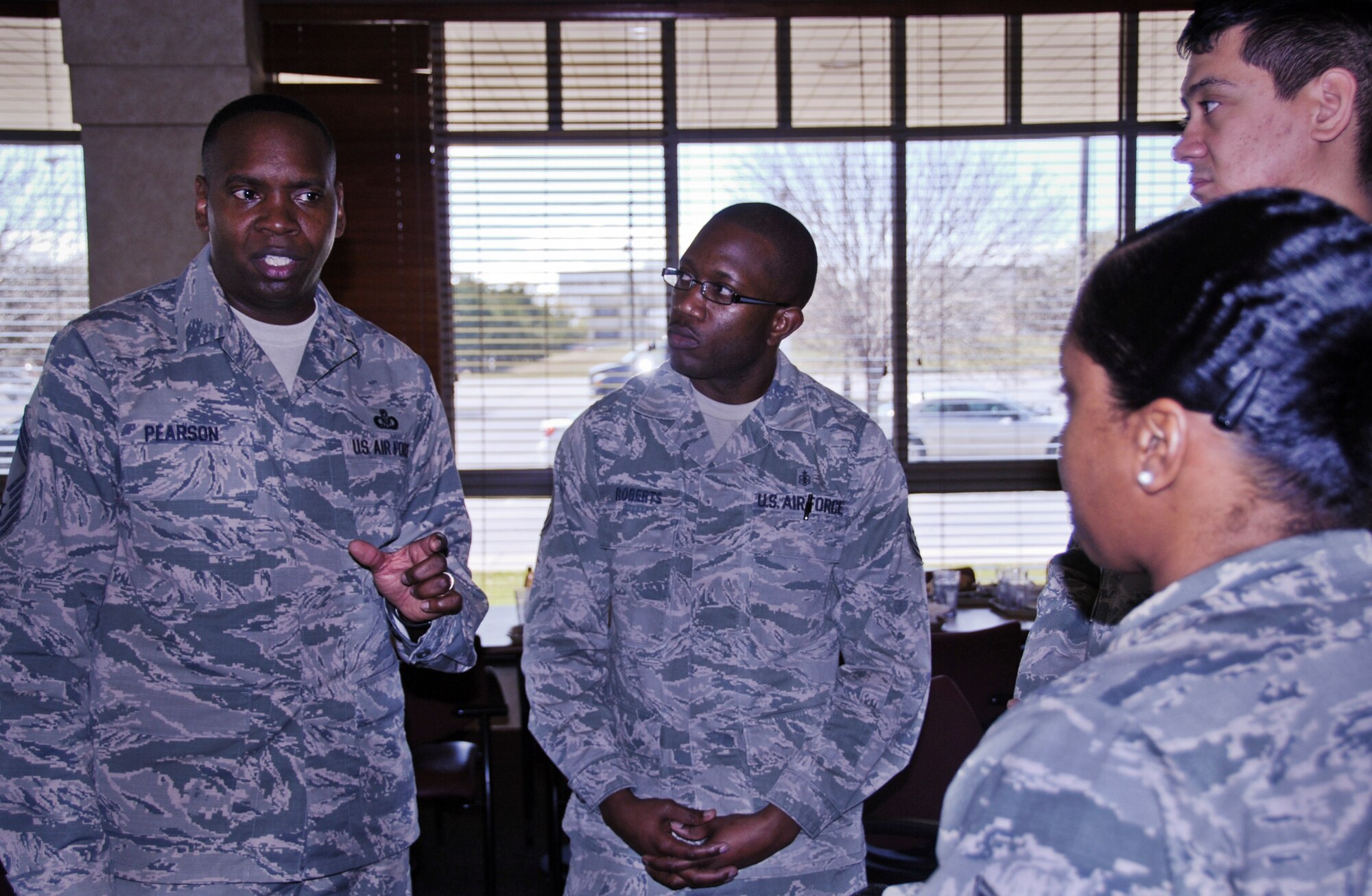Chief Master Sgt. Tony Pearson, the senior enlisted advisor for the Army & Air Force Exchange Service, addresses questions and concerns from Eglin Airmen at a lunch at the Breeze dining facility Feb. 25.  Pearson toured Eglin’s Exchange facilities and met with base and community members.  (U.S. Air Force photo/Kevin Gaddie)