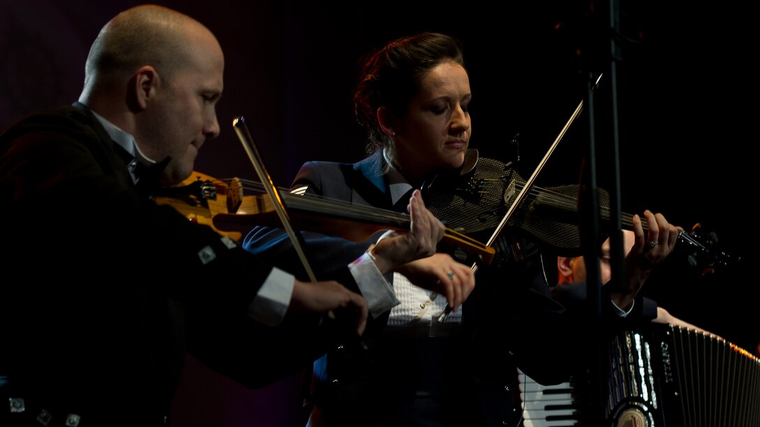 Musicians from The U.S. Air Force Band and The Rogues perform during the Guest Artist Series concert at the Daughters of the American Revolution Constitution Hall in Washington D.C., Feb. 24, 2013. The Rouges, a Celtic rock band, performed as the guest artists. (U.S. Air Force photo/ Staff Sgt. Perry Aston)