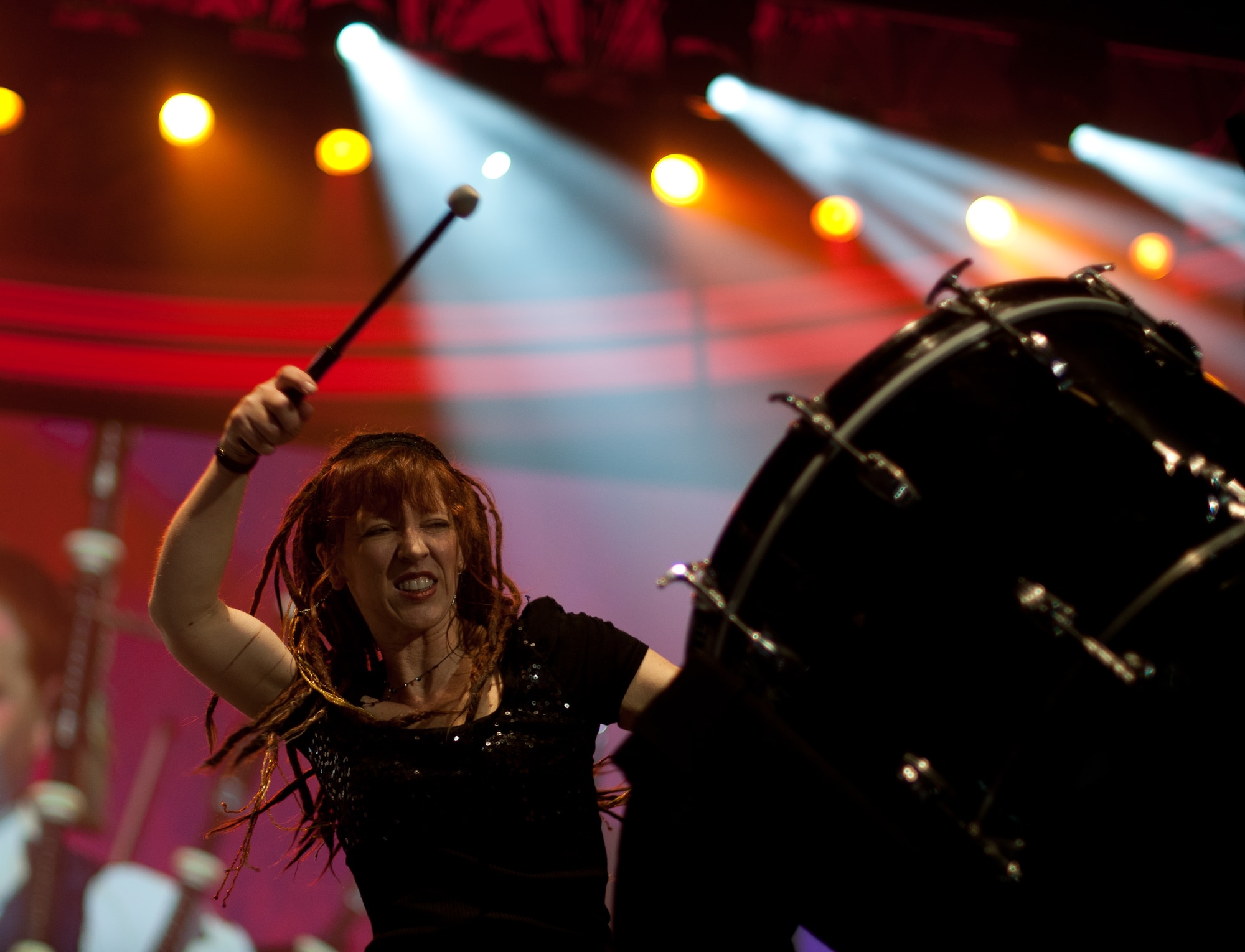 Catherine Hauke, a drummer for the Celtic rock band The Rogues, performs during the Guest Artist Series concert at the Daughters of the American Revolution Constitution Hall in Washington D.C., Feb. 24, 2013. The Rouges performed as the guest artists. (U.S. Air Force photo/ Staff Sgt. Perry Aston)