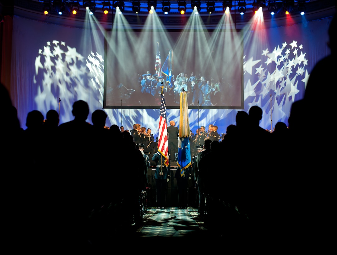 U.S. Air Force Honor Guard members post the colors for The National Anthem during the Guest Artist Series concert at the Daughters of the American Revolution Constitution Hall in Washington D.C., Feb. 24, 2013. The Rouges, a Celtic rock band, performed as the guest artists. (U.S. Air Force photo/Staff Sgt. Perry Aston)