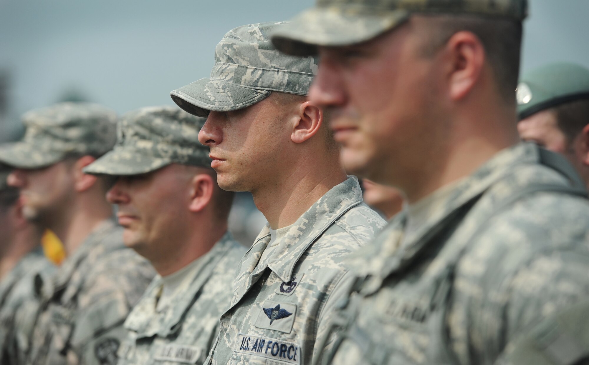 DOUALA, CAMEROON – U.S. Air Force Staff Sgt. Daniel Borowski, an aerial port air advisor assigned to the 818th Mobility Support Advisory Squadron, Joint Base McGuire-Dix-Lakehurst, N.J.,  stands in formation during the opening ceremony for Central Accord 2013, at Douala Air Force Base Douala, Cameroon, Feb. 20, 2013. Borowski  is participating in Central Accord 2013, a joint exercise in which U.S., Cameroon and neighboring Central African militaries partner to promote regional cooperation while and increasing aerial resupply and medical readiness capacity. (Photo by Master Sgt. MSgt Stan Parker, 621st CRW Public Affairs)