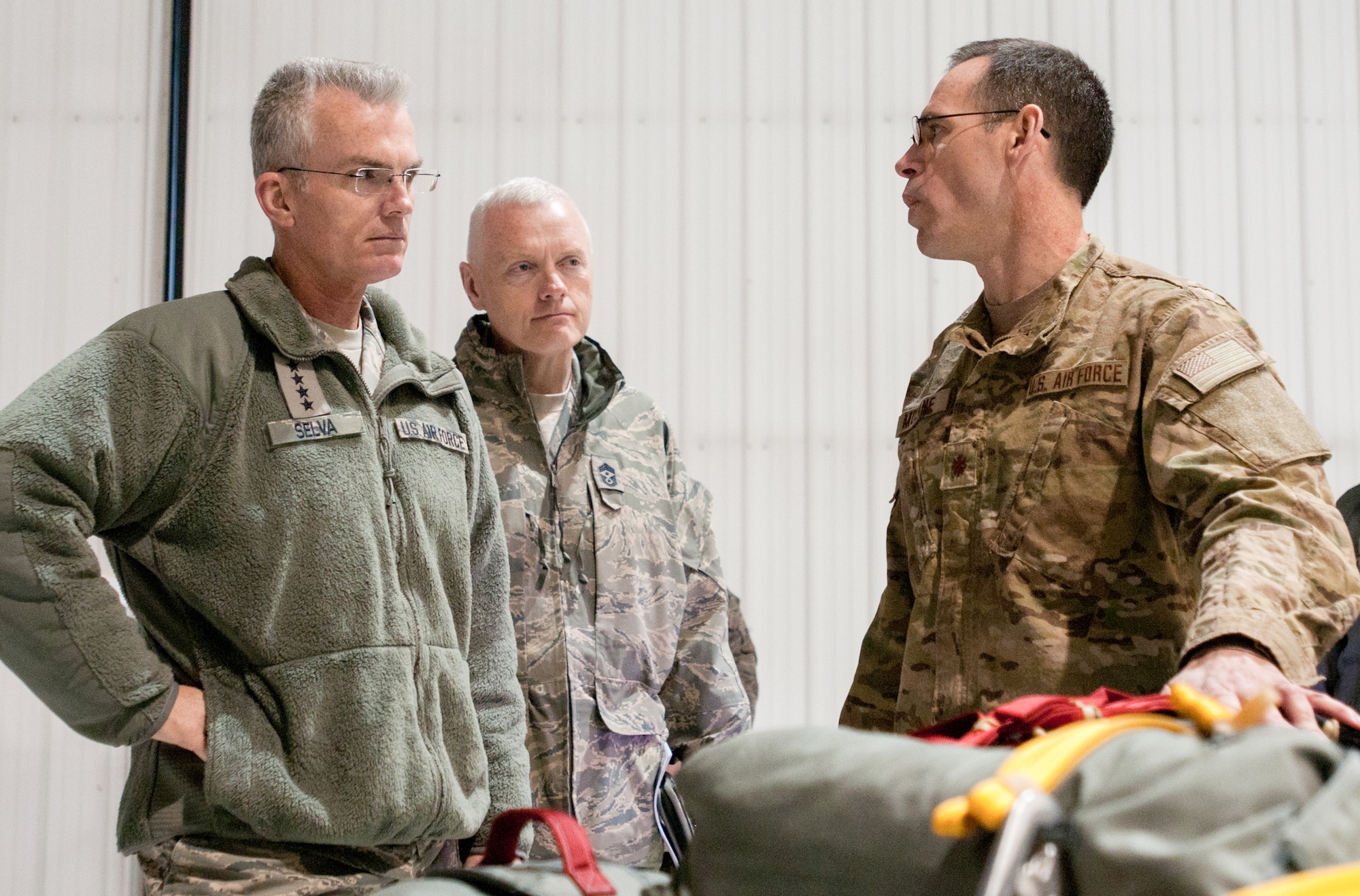 Kentucky Air National Guard Maj. Sean McLane, director of operations for the 123rd Special Tactics Squadron, shows a variety of special operations equipment to General Paul J. Selva, commander of Air Mobility Command, and Chief Master Sgt. Richard A. Kaiser, the command chief master sergeant of Air Mobility Command, during a tour of the 123rd Airlift Wing in Louisville, Ky., on Feb. 5, 2013. The gear is used to establish operations at austere landing zones. (Kentucky Air National Guard photo by Master Sgt. Phil Speck)
