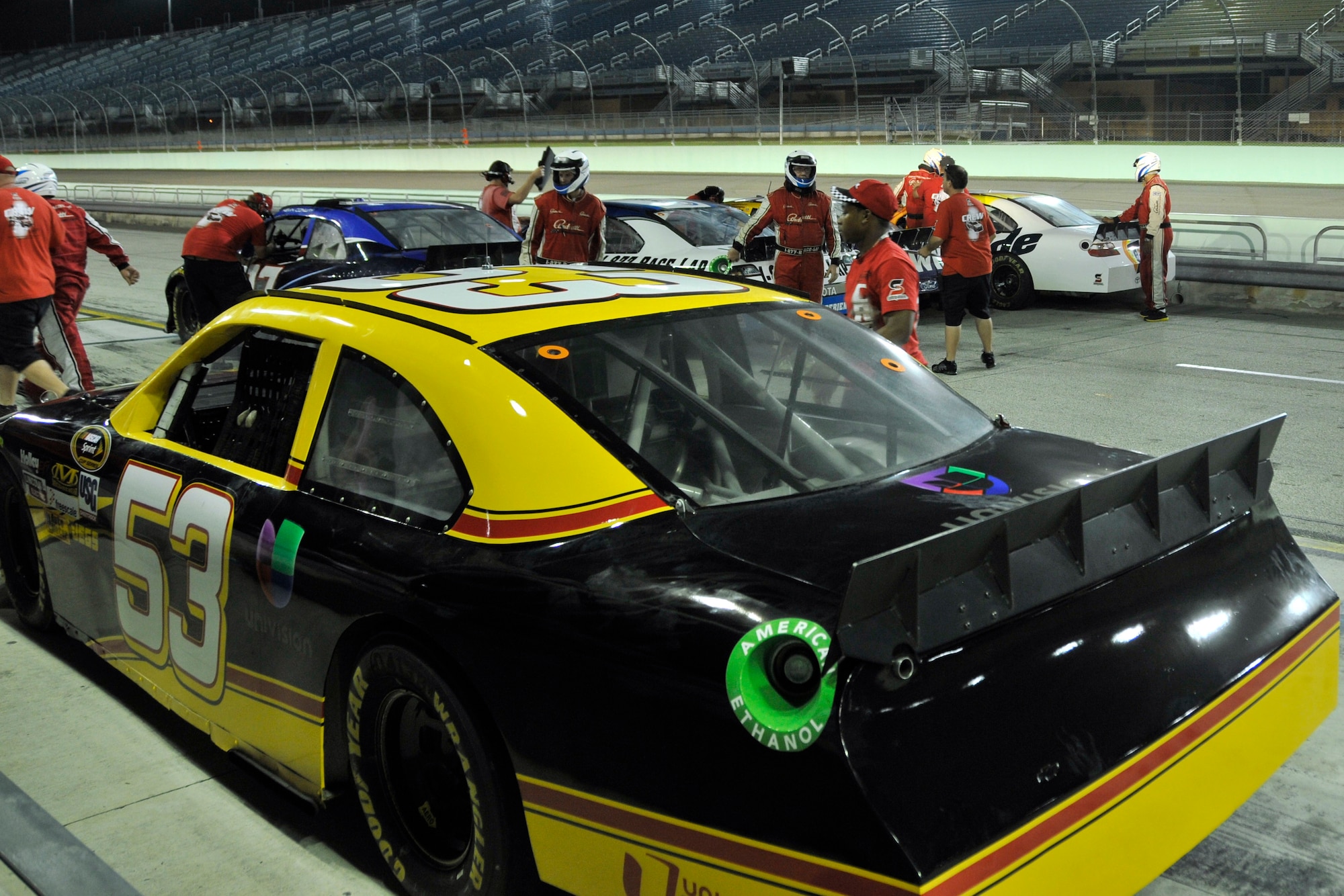 The crew of the Homestead-Miami Speedway in Homestead, Fla., prep NASCAR stock cars for the NASCAR Racing Experience. Airmen from Homestead Air Reserve Base, Fla., participated in the NASCAR Racing Experience in support of the Single Airman Initiative. During the event, Airmen took laps around the Speedway along with a professional racing instructor. The Single Airman Initiative is a program for all local servicemembers, regardless of rank, service, or marital status, to participate in several community events, to include airboat tours of the Florida Everglades and scuba diving classes, which are free of charge. (U.S. Air Force photo/Senior Airman Nicholas Caceres)