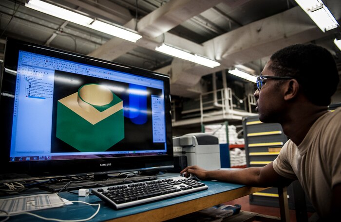 Airman 1st Class Tashma Antoine, 437th Maintenance Squadron aircraft metals apprentice, uses the shop computer to lay out a design plan for a metals project Feb. 26, 2013, at Joint Base Charleston – Air Base, S.C. Antoine is assigned to the aircraft metals fabrication shop and is trained to use several different pieces of equipment to bend, cut and combine metals. Antoine is originally from Fort Myers, Fla. (U.S. Air Force photo/ Senior Airman Dennis Sloan)