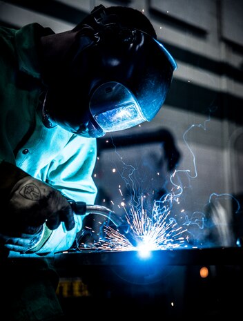 Airman 1st Class Tashma Antoine, 437th Maintenance Squadron aircraft metals apprentice, performs an inert gas weld Feb. 26, 2013, at Joint Base Charleston – Air Base, S.C. In inert gas welding, an arc is struck between an electrode and the sheet metal to be welded. Antoine is assigned to the aircraft metals fabrication shop and is trained to use several different pieces of equipment to bend, cut and combine metals. Antoine is originally from Fort Myers, Fla. (U.S. Air Force photo/ Senior Airman Dennis Sloan)