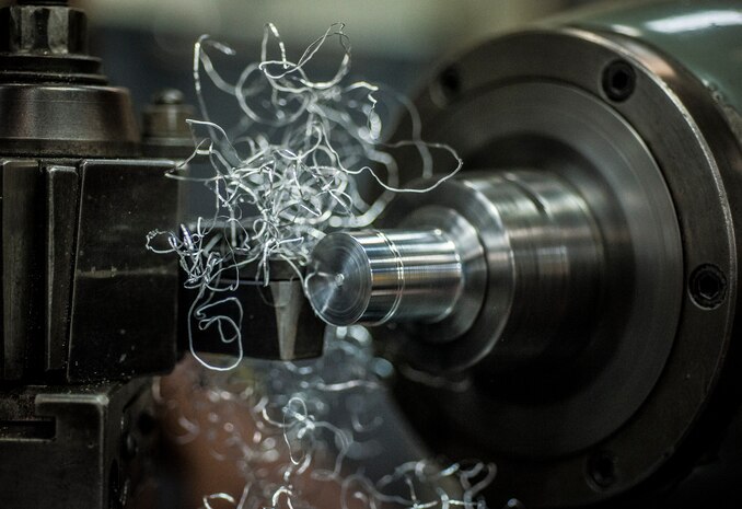 Airman 1st Class Tashma Antoine, 437th Maintenance Squadron aircraft metals apprentice, uses a lathe to reduce the diameter of a metal rod Feb. 26, 2013, at Joint Base Charleston – Air Base, S.C. Antoine is assigned to the aircraft metals fabrication shop and is trained to use several different pieces of equipment to bend, cut and combine metals. Antoine is originally from Fort Myers, Fla.  (U.S. Air Force photo/ Senior Airman Dennis Sloan)