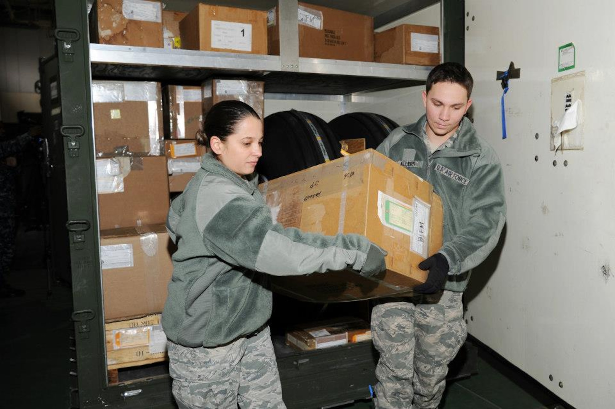 YOKOTA AIR BASE, Japan -- Senior Airman Agnia Leal and Airman Basic Ryan Allers, 927th Logistics Readiness Squadron, inventory an aircraft spares kit February 19, 2013 at Yokota Air Base, Japan.  Performing the inventory allowed the members of this Air Force Reserve squadron, based at MacDill Air Force Base, Fl. to gain a unique training opportunity not typically seen at their home base. (Official U.S. Air Force photo/Staff Sgt. Jannie Chamberlin) 