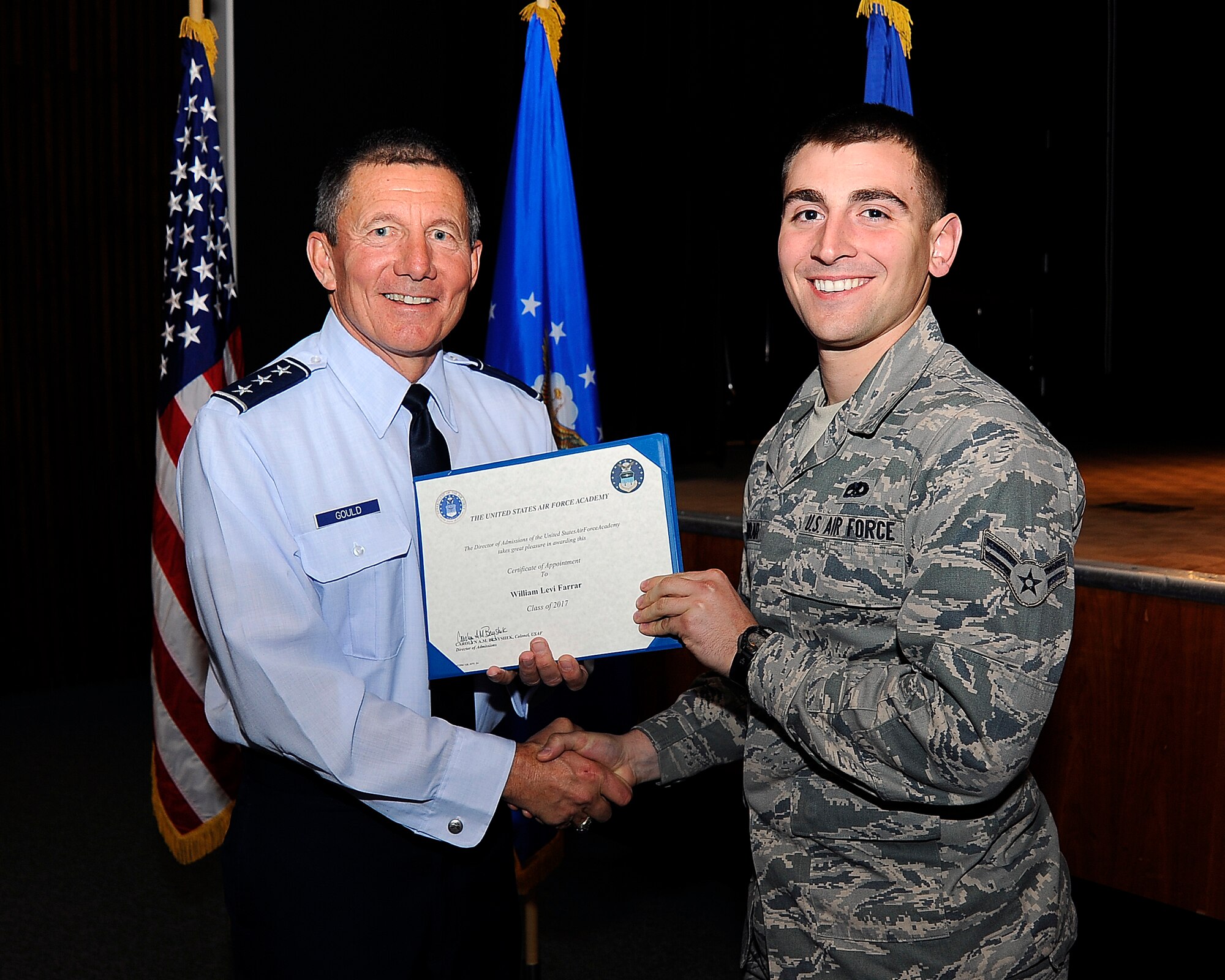 Airman 1st Class William Farrar, 7th Aircraft Maintenance Squadron, is awarded a Certificate of Appointment to the U.S. Air Force Academy by Lt. Gen. Michael C. Gould, U.S. Air Force Academy superintendent, Feb. 14, 2013, at the U.S. Air Force Academy in Colorado Springs, Colo. After spending nearly a year at Dyess learning the ins and outs of Air Force life, Farrar once again submitted his application to attend the Air Force Academy through the Leaders Encouraging Airmen Development, or LEAD, program. (Courtesy photo)