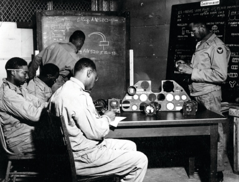 “Tuskegee Airmen” personnel review the operations of various aircraft instruments in this photo taken sometime in 1943 or 1944 at what is now called Selfridge Air National Guard Base. During World War II, Selfridge served as one of several key training sites for the all-African American units that later came to be known as the Tuskegee Airmen. (Air Force file photo)