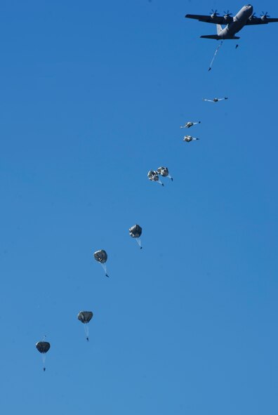 U.S. Soldiers with the 82nd Airborne Division conduct a static line airdrop from an Air Force C-130J Hercules aircraft during Joint Operational Access Exercise (JOAX) 13-2 at Camp Mackall, N.C., Feb. 24, 2013. A JOAX is designed to enhance cohesiveness between U.S. Army, Air Force and allied personnel, allowing the services an opportunity to properly execute large-scale heavy equipment and troop movement. (U.S. Air Force photo by Airman 1st Class Kyle Russell/Released)
