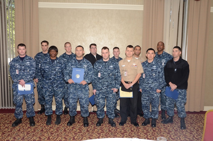 Joint Base Charleston Navy Sailors gather during the inaugural JB Charleston Individual Augmentee Appreciation Luncheon, Feb. 15, 2013, at the Redbank Club at JB Charleston – Weapons Station, S.C. Individual Augmentees perform duties outside of standard Navy platforms alongside Soldiers, Marines and Airmen world-wide. (U.S. Navy photo/Petty Officer 1st Class Chad Hallford)