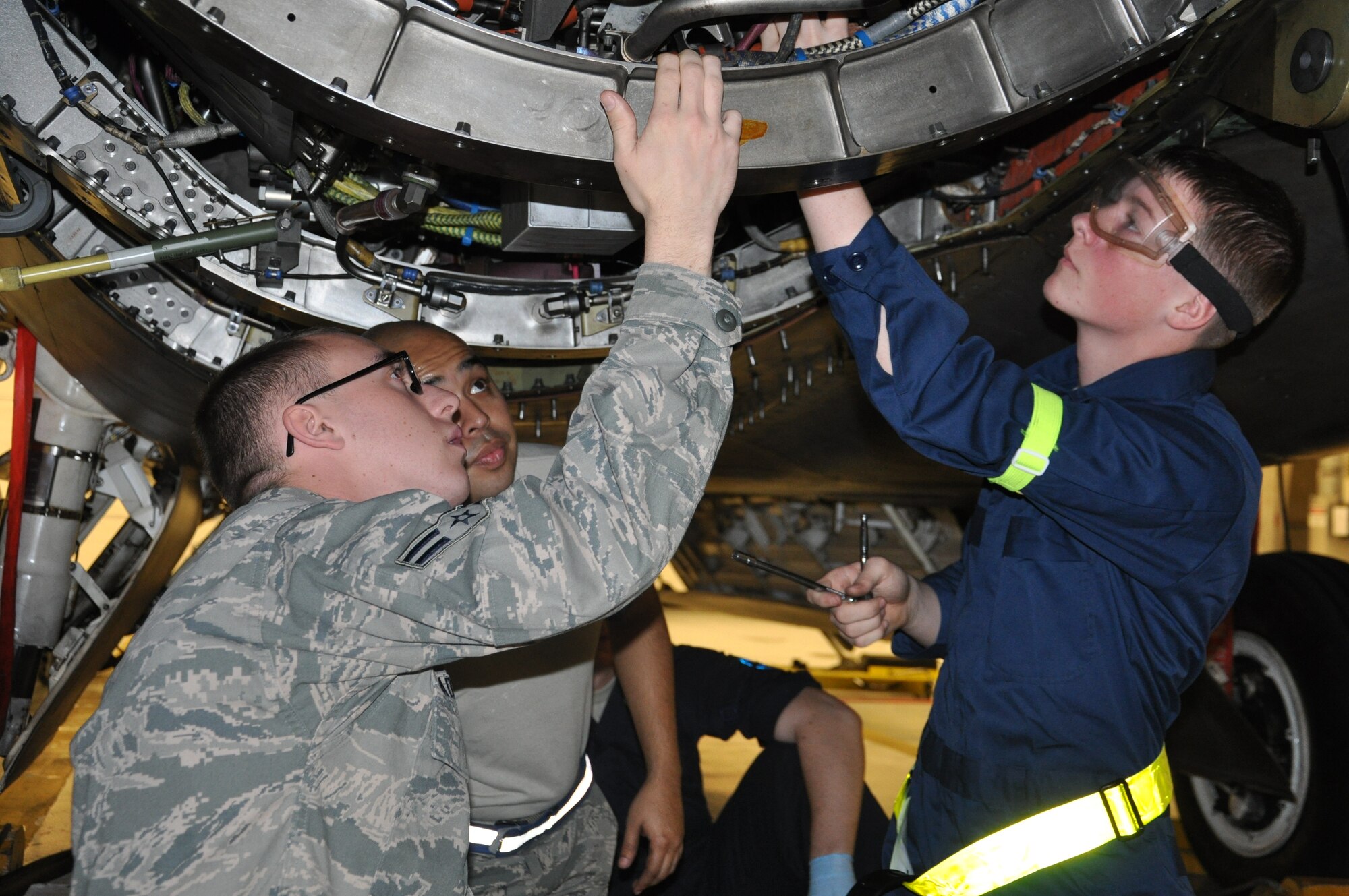 Airmen, from the 43rd Aircraft Maintenance Unit, perform maintenance on an F-22 Raptor (U.S. Air Force photo by Staff Sgt. Rachelle Elsea)