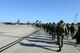 U.S. Soldiers with the 82nd Airborne Division and Canadian soldiers with the Royal Canadian Regiment prepare to board an aircraft for a static line airdrop during Joint Operational Access Exercise (JOAX) 13-02 at Fort Bragg, N.C., Feb. 24, 2013. A JOAX is designed to enhance cohesiveness between U.S. Army, Air Force and allied personnel, allowing the services an opportunity to properly execute large-scale heavy equipment and troop movement. (U.S. Air Force photo by Tech. Sgt. Jason Robertson/Released)
