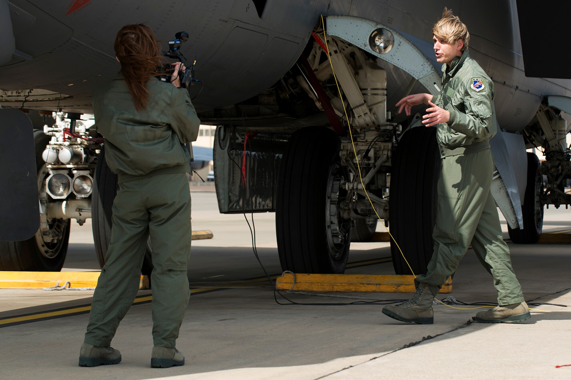 KTAL Channel 6 News reporters Leslie Draffin and Joel Rodgers video a news segment on the mission of the 93rd Bomb Squadron and the B-52H Stratofortress, Feb. 26, 2013, Barksdale Air Force Base, La. The reporters were given a flight on a B-52 assigned to the 307th Bomb Wing at Barksdale. (U.S. Air Force photo by Master Sgt. Greg Steele/Released)