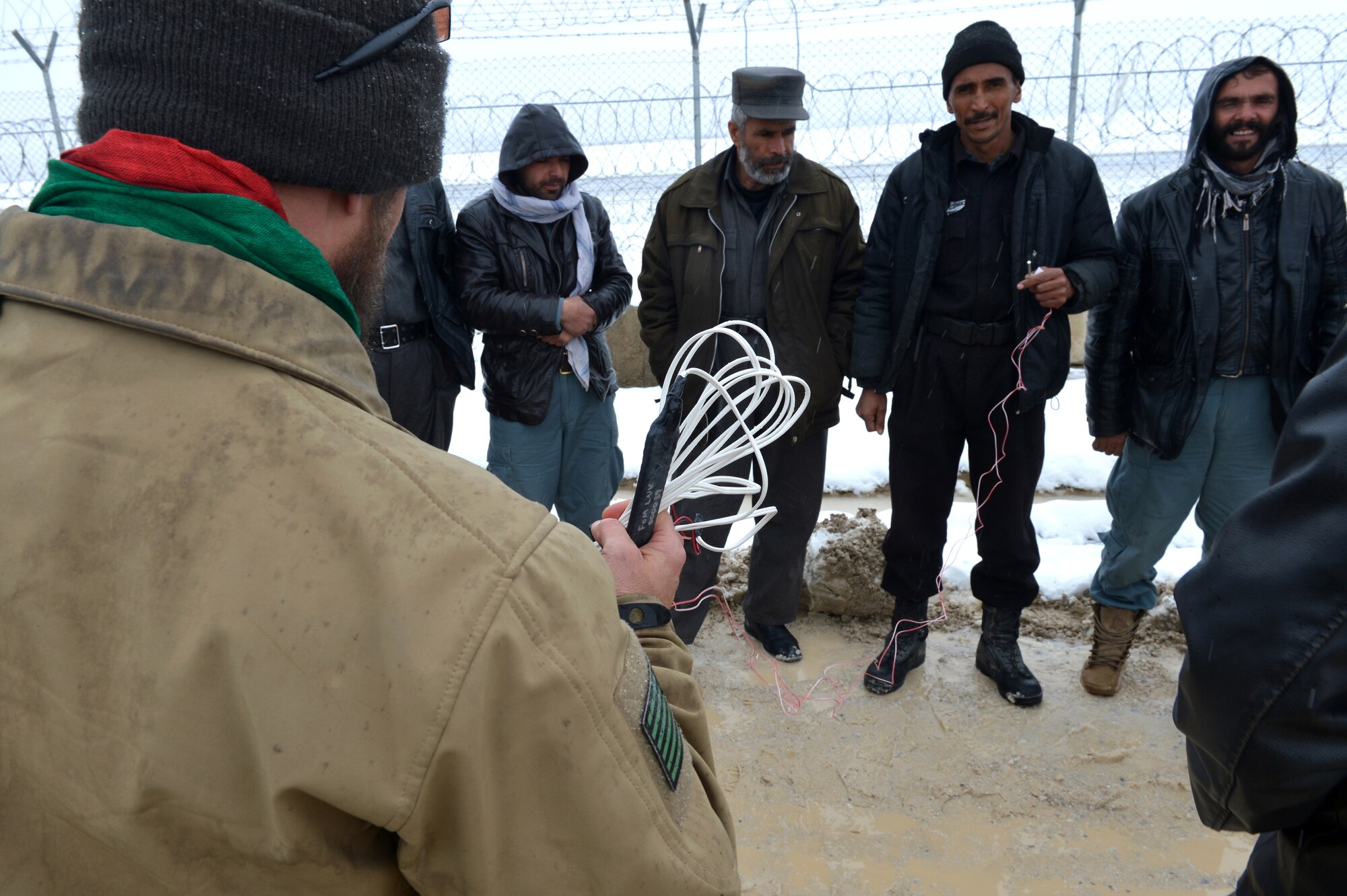 Members of the Afghan National Police practice counter-improvised explosive device awareness tactics at Bagram Airfield, Afghanistan, Feb. 27, 2013.  The training was operated under the auspices of Task Force-Paladin, with a mix of U.S. Air Force, Army and civilian instructors.  (U.S. Air Force photo/Senior Airman Chris Willis)