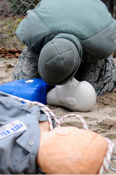 Senior Airman Francisco Villa, 786th Civil Engineer Squadron electrical journeyman, performs CPR on a simulated victim a readiness exercise, Feb. 21, 2013, Ramstein Air Base, Germany. Readiness exercises are designed to educate and train Airmen on the skills needed for real-world responses. (U.S. Air Force photo/Airman 1st Class Hailey Haux)