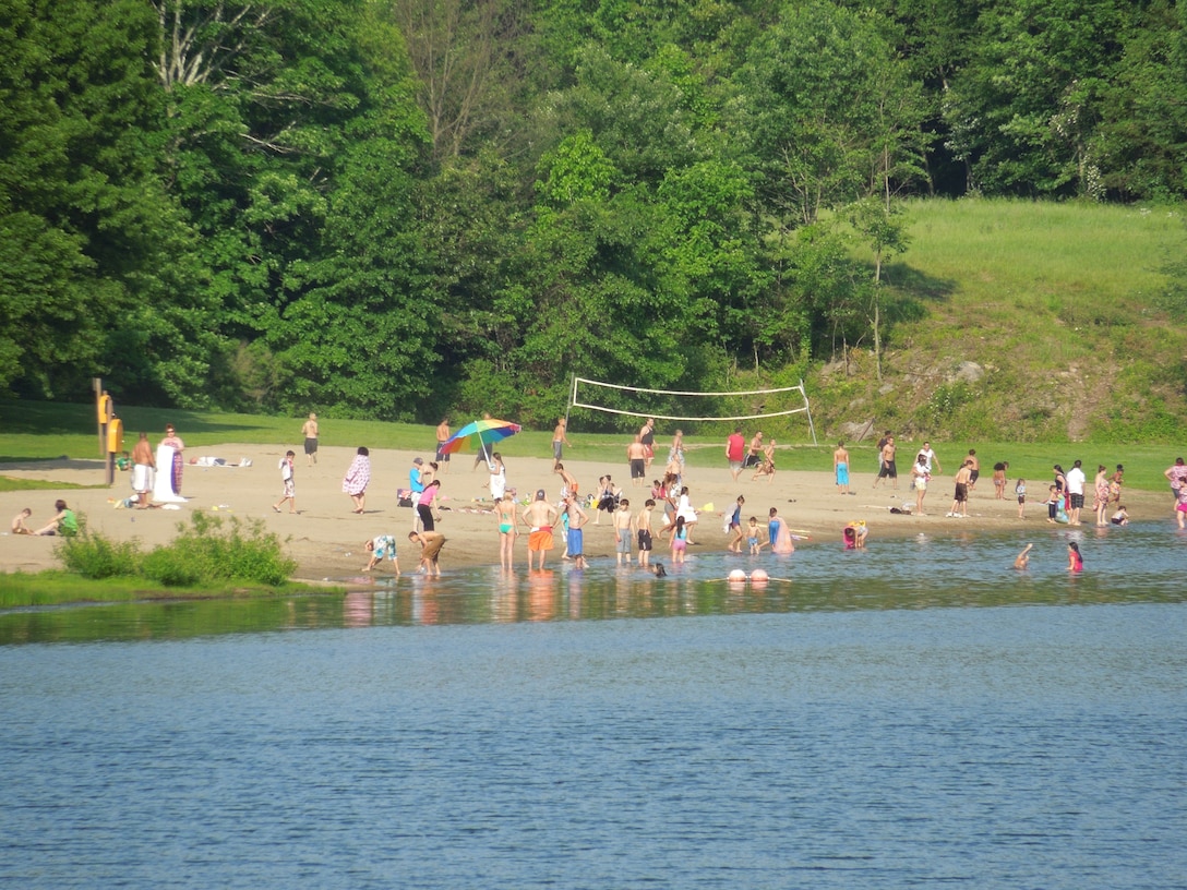 Visitors of Hop Brook Lake take advantage of the lake's beach and swimming areas, as well as the opportunity to fish over the Memorial Day weekend. The lake and dam are located in the towns of Naugatuck, Waterbury, and Middlebury, Conn. The recreation area is open from mid-April through mid-October, from 08:00 a.m. to sunset.