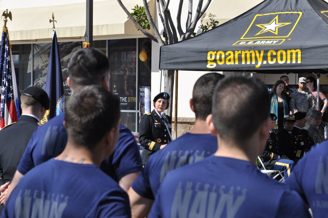 Maj. Gen. Megan Tatu, commanding general of the 79th Sustainment Support Command, addresses the crowd of over 100 guests, civic leaders, recruiting personnel, and future soldiers and sailors during the grand opening of the joint service recruiting center in El Monte, Calif., Feb. 26.