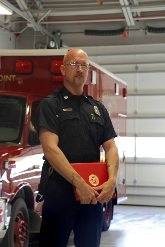 Lieutenant Michael Barbour, a firefighter with Cherry Point Emergency Services, waits to give his speech for the Cherry Point Firefighter of the Year Award at the Fire Station 2 garage aboard Cherry Point Feb. 21. 

