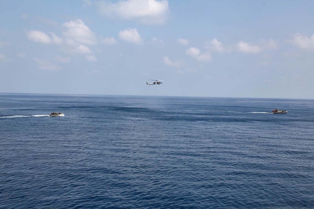 Marines assigned to Maritime Raid Force, Command Element, 15th Marine Expeditionary Unit, conduct small-boat operations near the USS Rushmore, Feb. 21. The 15th MEU is deployed as part of the Peleliu Amphibious Ready Group as a U.S. Central Command theater reserve force, providing support for maritime security operations and theater security cooperation efforts in the U.S. 5th Fleet area of responsibility. (U.S. Marine Corps photo by Cpl. Timothy R. Childers/Released)