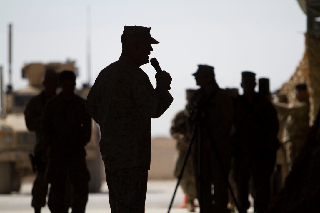 Major Gen. Charles M. Gurganus, I Marine Expeditionary Force (Forward) commanding general, gives a speech during the Regional Command (Southwest) Transfer of Authority ceremony here, Feb. 28. The Marines I MEF (Fwd) redeployed back to Marine Corps Base Camp Pendleton, Calif., after a year of fighting the insurgency and transitioning the fight to Afghan-led operations. (U.S. Army photo by Bill Putnam/Released)
