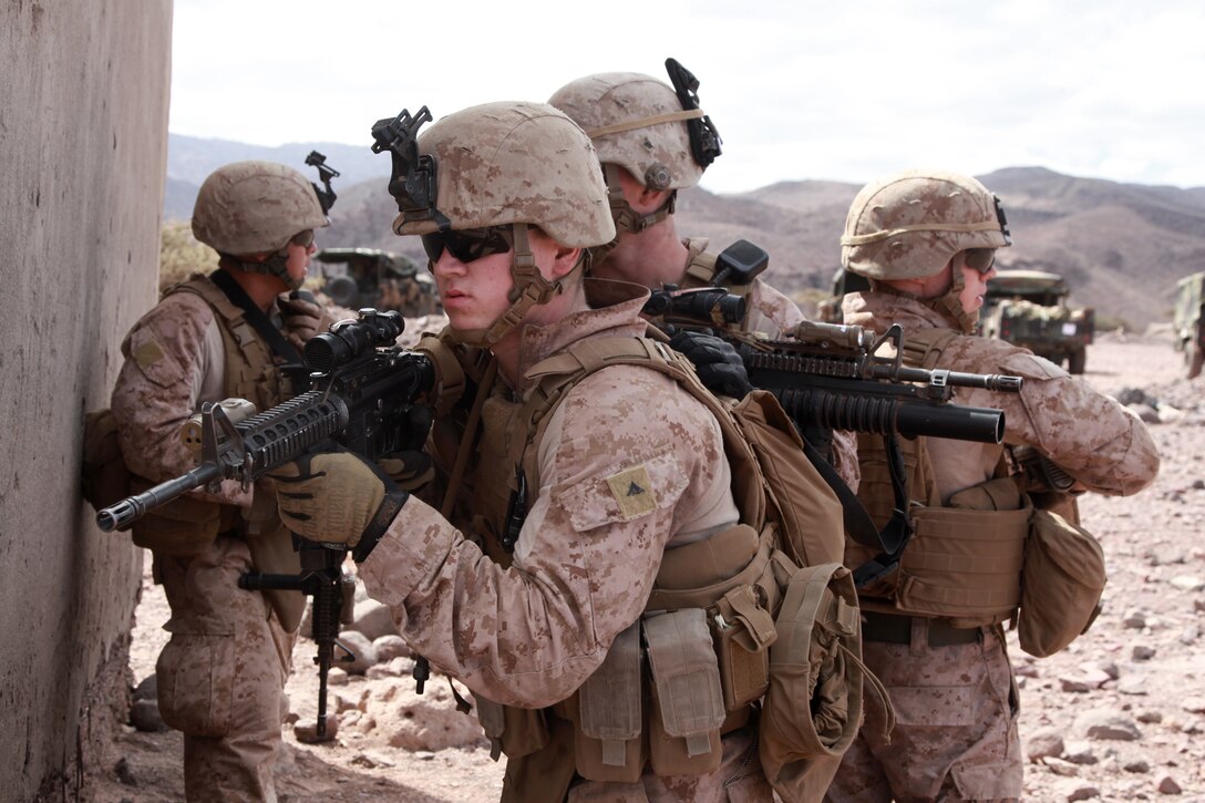 Lance Cpl. Jordan S. Lewis, mortarman, 81mm Mortars/Tactical Recovery of Aircraft and Personnel Platoon, Weapons Company, Battalion Landing Team 3/5, 15th Marine Expeditionary Unit, serves as a point man during military operations on urban terrain training, Feb. 10. The unit practiced MOUT during the 15th MEU’s sustainment training, designed to increase unit cohesion and refine tactics, techniques and procedures, while taking advantage of a unique opportunity to train in a foreign country. The 15th MEU is deployed as part of the Peleliu Amphibious Ready Group as a U.S. Central Command theater reserve force, providing support for maritime security operations and theater security cooperation efforts in the U.S. 5th Fleet area of responsibility. Lewis, 20, is from Madison, Wis. (U.S. Marine Corps photo by Cpl. John Robbart III/Released)