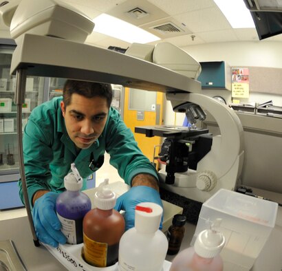 WHITEMAN AIR FORCE BASE, Mo. -- Staff Sergeant Raul Loyo, 509th Medical Group Laboratory Technician, checks expiration dates on the gram stain equipment, Feb. 20. This equipment used to differentiate bacterial species into two large groups, gram-positive and gram-negative.
( U.S. Air Force photo by Airman 1st Class Keenan Berry) (Released)
