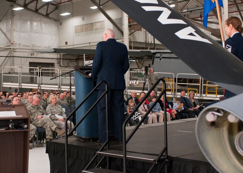Col. Thomas J. Riney, 22nd Opertions Group Commander, speaks to the members of the 157th Air Refeuling Wing and 64th Air Refueling Squadron during a Change of Command ceremony, Pease Air National Guard Base, N.H., Feb 28, 2013.  Riney was the presiding officer. (National Guard photo by Walter Santos/Released)
