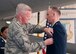 Lt. Col. Ryan R. Samuelson, recieves the New Hampshire National Guard Distinguished Service medal from Col.Paul Hutchinson, 157th Air Refueling Wing Commander during a Change of Command ceremony for the 64th Air Refueling Squadron, Pease Air National Guard Base, N.H., February 28, 2013.  Samuelson is the 64 ARS relenquishing commander.  (National Guard photo by Walter Santos/Released)