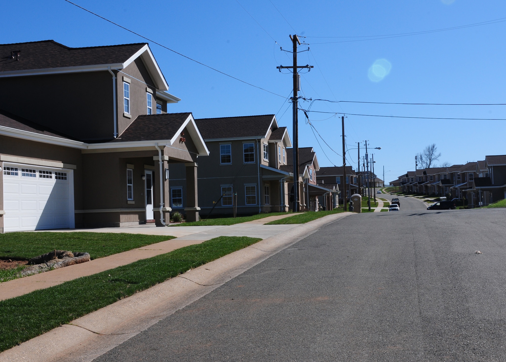New homes from the Balfour Beatty Communities housing privatization project receive final touches at Beale Air Force Base, Calif., Feb. 26, 2013. A ribbon cutting ceremony will be held April 24, 2013 signifying the opening of the homes. (U.S. Air Force photo by Senior Airman Allen Pollard/Released)