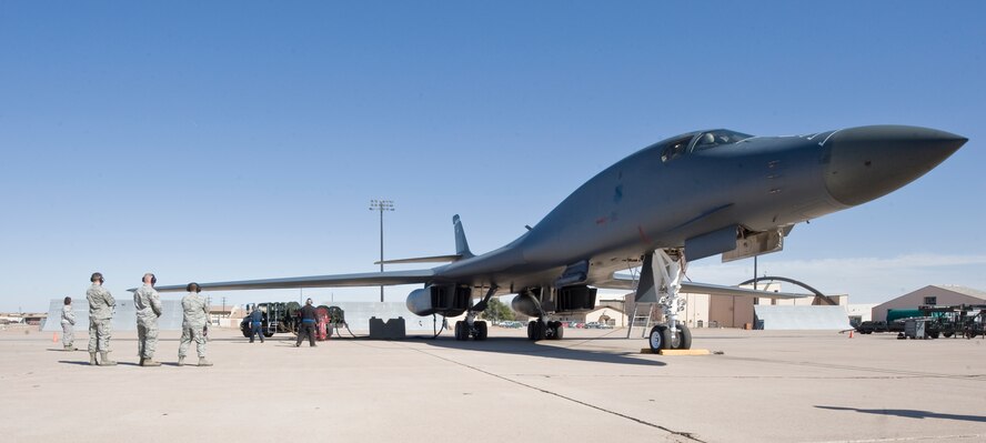 A B-1 Bomber undergoes a hot pit refuel Feb. 22, 2013, at Dyess Air Force Base, Texas. New to the B-1 Bomber, hot pit refueling is a procedure used to rapidly refuel the aircraft while their engines are running, resulting in a speedy refuel. (U.S. Air Force photo by Airman 1st Class Jonathan Stefanko/ Released)